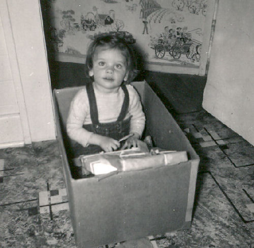 Andrea playing in box.